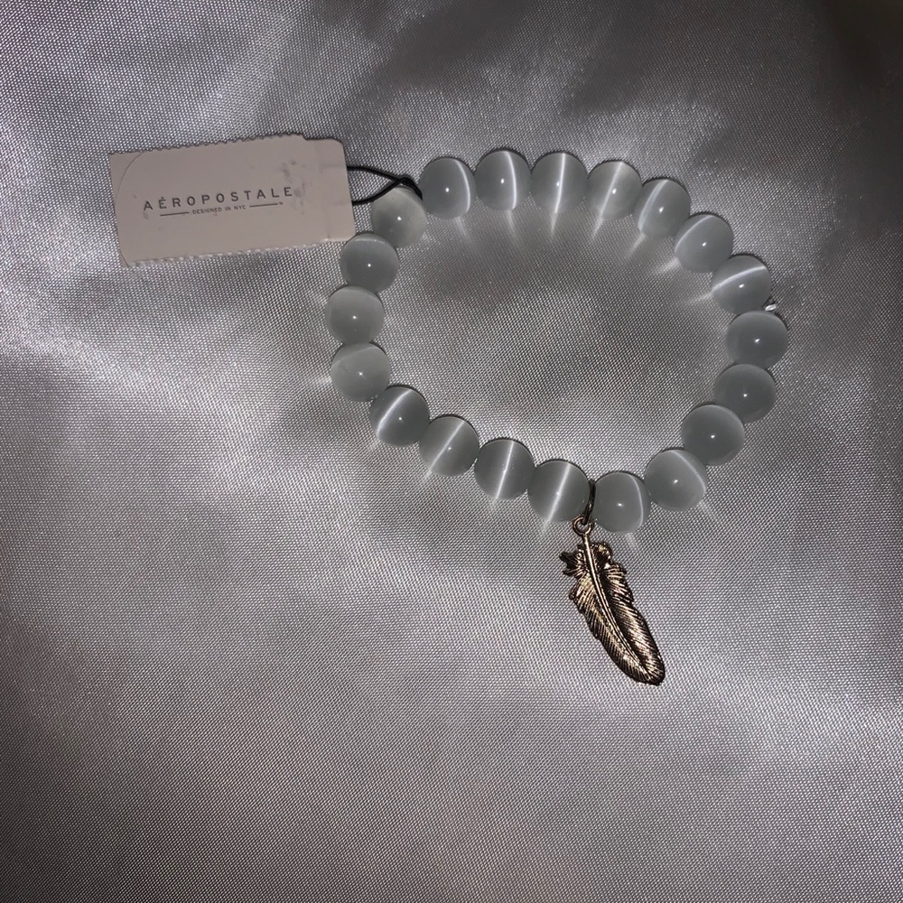 Pretty Bead and Feather Bracelet